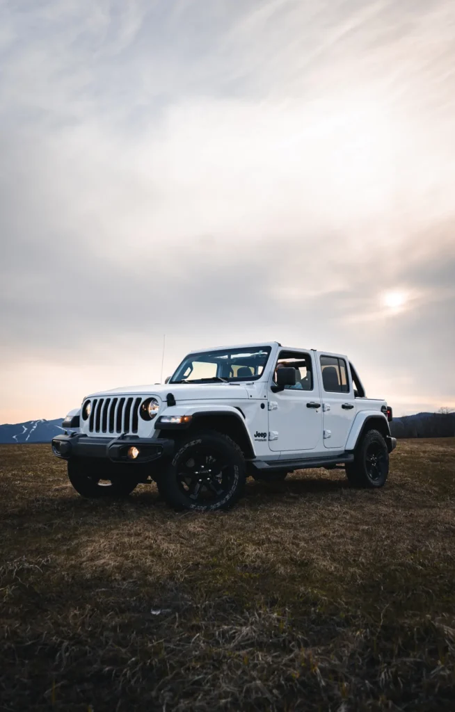 Image of green Custom Jeep front drivers side tire that could be updated from Mission Customs 
